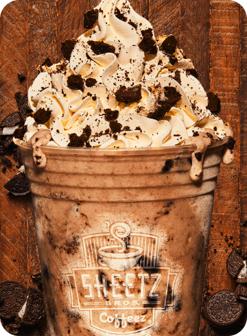cookies and cream milkshake on a wooden background